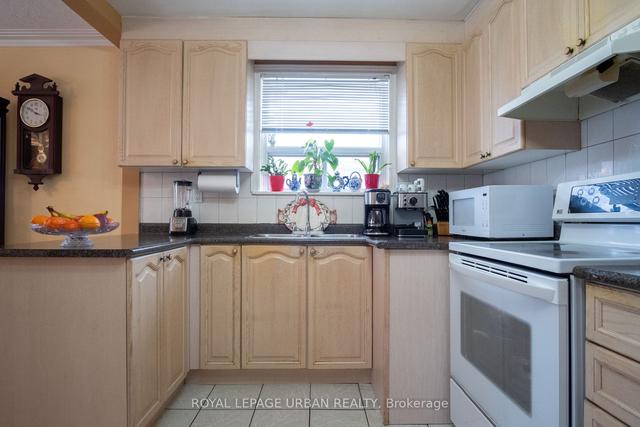 99 Falstaff Ave, House detached with 3 bedrooms, 2 bathrooms and 8 parking in Toronto ON | Image 7