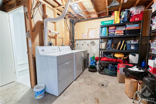 Washer and dryer located in basement | Image 21