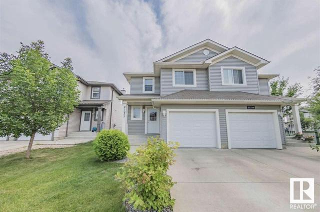 21235 90 Av Nw, House semidetached with 3 bedrooms, 3 bathrooms and null parking in Edmonton AB | Card Image