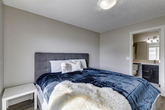 35 Aspen Hills Green Sw, Home with 2 bedrooms, 2 bathrooms and 2 parking in Calgary AB | Image 27