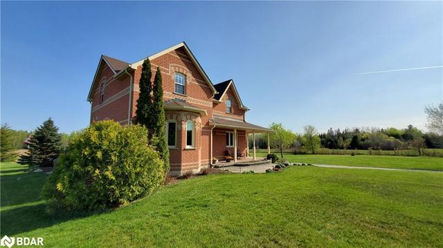 3167 6 Flos Road W, House detached with 5 bedrooms, 3 bathrooms and 13 parking in Springwater ON | Image 3
