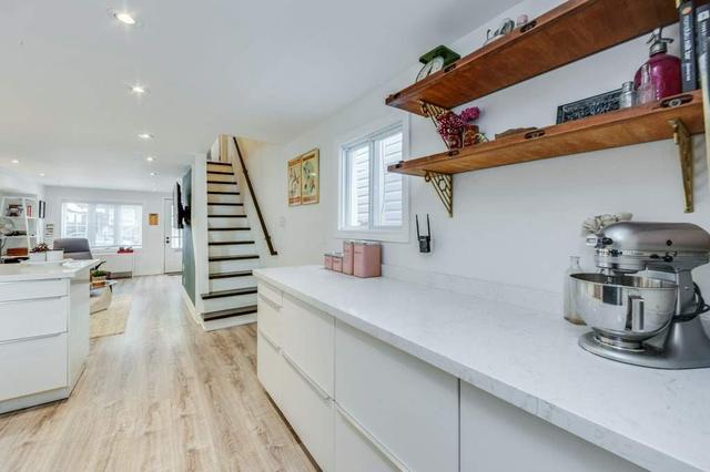 116 Rhodes Ave, House attached with 2 bedrooms, 1 bathrooms and 1 parking in Toronto ON | Image 3