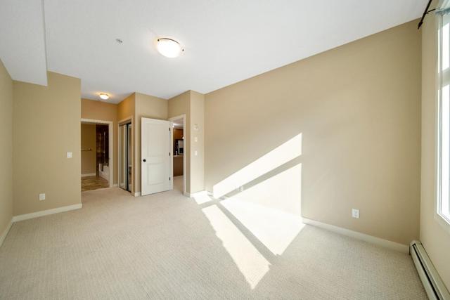 211 - 35 Aspenmont Heights Sw, Condo with 2 bedrooms, 2 bathrooms and 1 parking in Calgary AB | Image 19