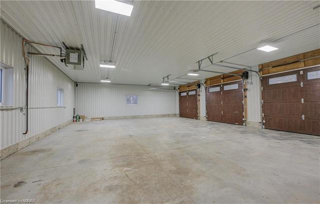 A unique addition is the massive 1235 sq ft detached workshop/triple bay garage with a natural gas heater (2020) and hydro, ideal for hobbies or storing recreational vehicles. | Image 30