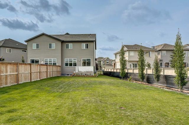 340 Quigley Drive, Home with 4 bedrooms, 3 bathrooms and 2 parking in Cochrane AB | Image 37