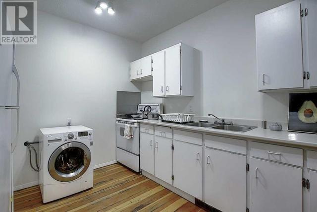 Unit #1 - Kitchen w Combination Washer Dryer | Image 10
