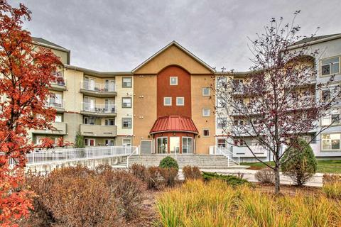 2105 - 700 Willowbrook Road Nw, Condo with 2 bedrooms, 2 bathrooms and 1 parking in Airdrie AB | Card Image