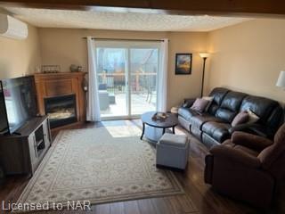 living room with gas fireplace | Image 3