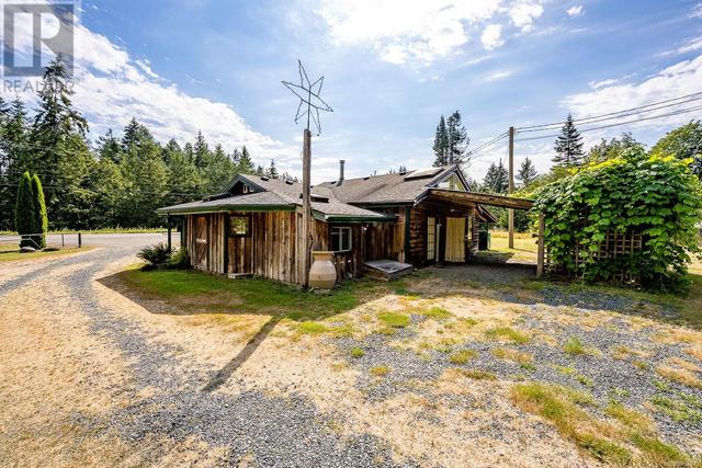 8185 Island Hwy S, House detached with 4 bedrooms, 4 bathrooms and 6 parking in Comox Valley A BC | Image 25