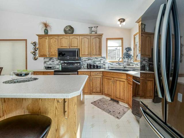 118 Heritage Place W, House detached with 3 bedrooms, 3 bathrooms and 4 parking in Lethbridge AB | Image 13
