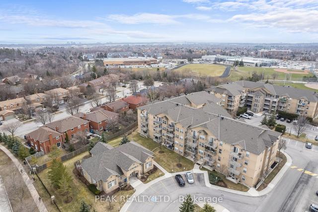 310 - 1440 Bishops Gate, Condo with 2 bedrooms, 2 bathrooms and 1 parking in Oakville ON | Image 36