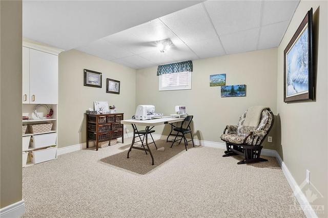 Flexible space currently used as craft room and gym room. | Image 24