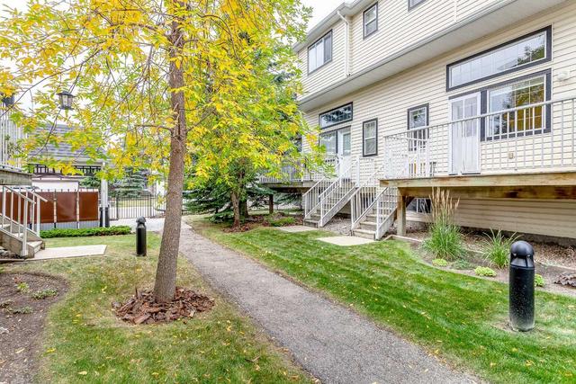 71 Cougar Ridge Mews Sw, Home with 2 bedrooms, 1 bathrooms and 2 parking in Calgary AB | Image 35