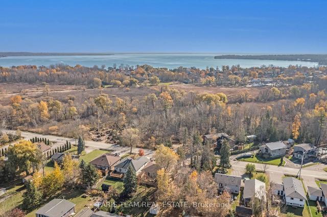 1060 Belle Aire Beach Rd, House detached with 3 bedrooms, 3 bathrooms and 6 parking in Innisfil ON | Image 21