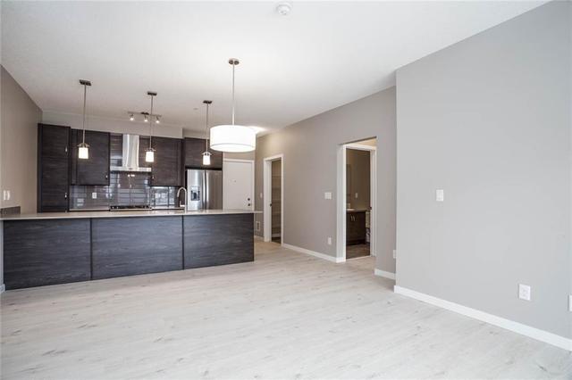 208 - 11 Mahogany Circle Se, Condo with 2 bedrooms, 2 bathrooms and 1 parking in Calgary AB | Image 3