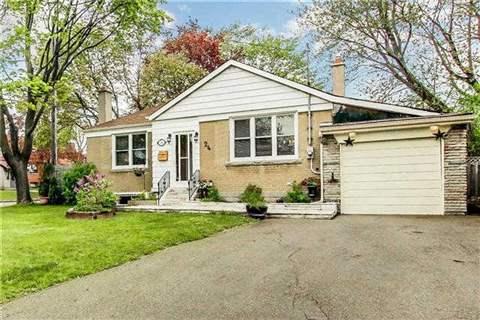 24 Latham Ave, House detached with 2 bedrooms, 2 bathrooms and 5 parking in Toronto ON | Image 1