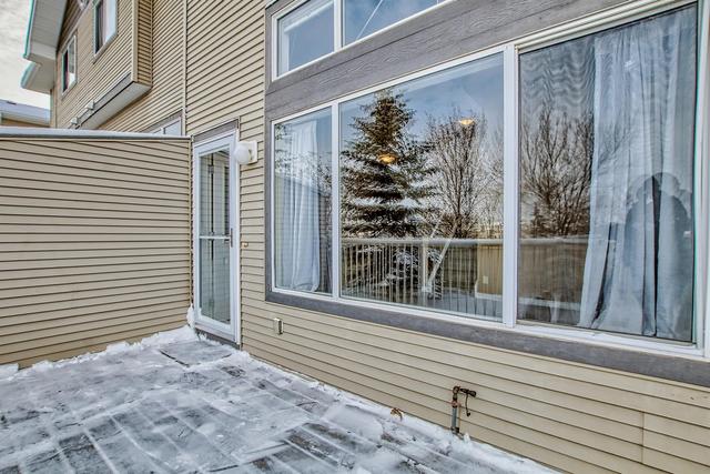 80 Crystal Shores Cove, Home with 3 bedrooms, 2 bathrooms and 2 parking in Calgary AB | Image 19
