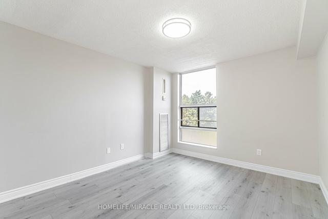 410 - 25 Kensington Rd, Condo with 2 bedrooms, 1 bathrooms and 1 parking in Brampton ON | Image 11