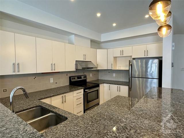 103 Hawkeswood Drive, Townhouse with 3 bedrooms, 3 bathrooms and 2 parking in Ottawa ON | Image 4