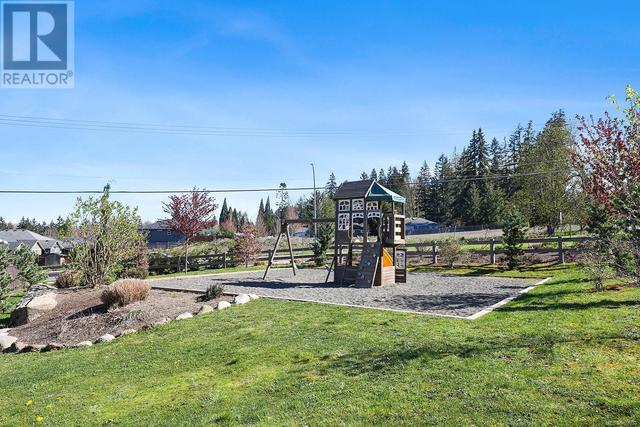 136 - 2077 20th St, House attached with 3 bedrooms, 3 bathrooms and 2 parking in Courtenay BC | Image 23
