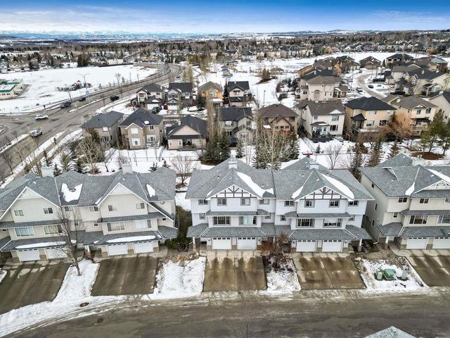 12 Crystal Shores Cove, Home with 2 bedrooms, 2 bathrooms and 2 parking in Calgary AB | Image 27