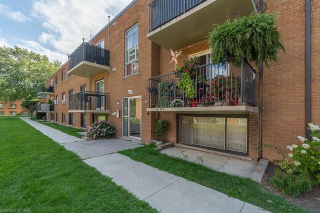 28 - 450 Carlton Street, House attached with 2 bedrooms, 1 bathrooms and 1 parking in St. Catharines ON | Image 13