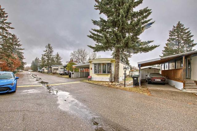 99 - 3223 83 Street Nw, Home with 3 bedrooms, 1 bathrooms and 2 parking in Calgary AB | Image 38