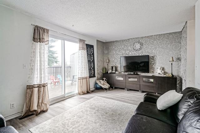 5 - 195 Manora Place Ne, Home with 3 bedrooms, 1 bathrooms and 2 parking in Calgary AB | Image 9