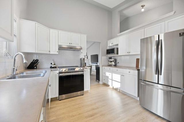 92 Sierra Morena Green Sw, Home with 2 bedrooms, 2 bathrooms and 4 parking in Calgary AB | Image 3