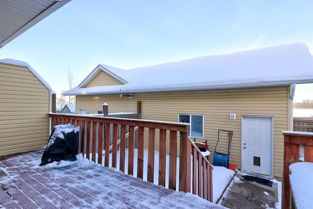 8766 72 Avenue, Home with 4 bedrooms, 3 bathrooms and 2 parking in Greenview No. 16 AB | Image 34