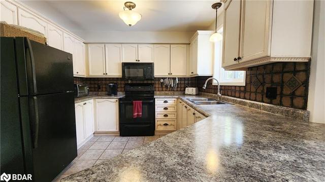 70 Golden Eagle Way, House detached with 5 bedrooms, 2 bathrooms and null parking in Barrie ON | Image 4