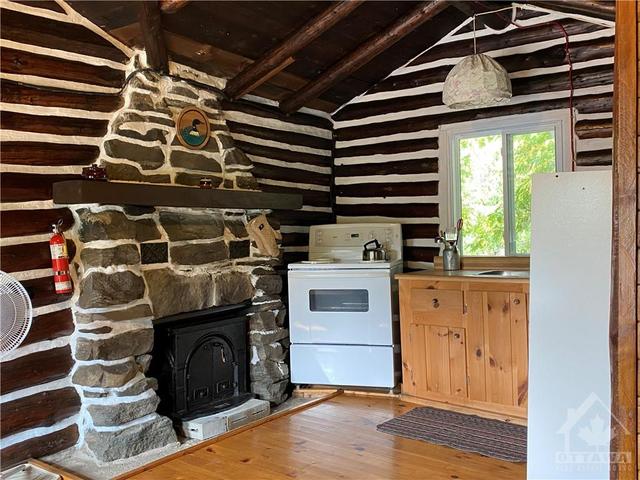 1032 Log Cabin Lane, House detached with 6 bedrooms, 5 bathrooms and 10 parking in North Frontenac ON | Image 20