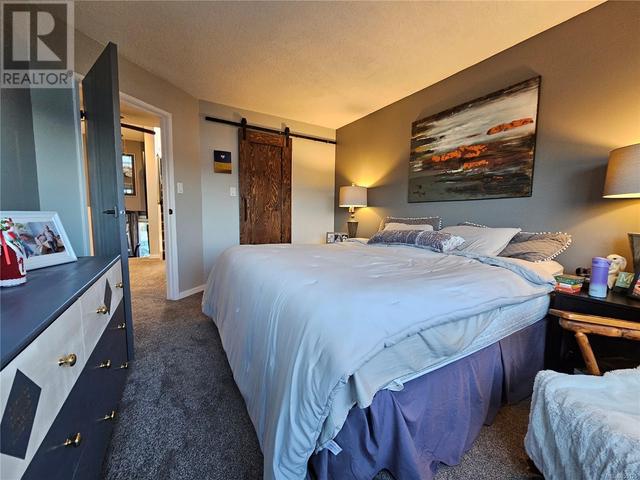 204b - 6231 Blueback Rd, Condo with 2 bedrooms, 1 bathrooms and 2 parking in Nanaimo BC | Image 38