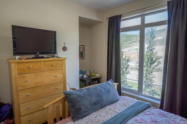 207, - 141 Mountain Street, Condo with 2 bedrooms, 2 bathrooms and 1 parking in Cochrane AB | Image 14
