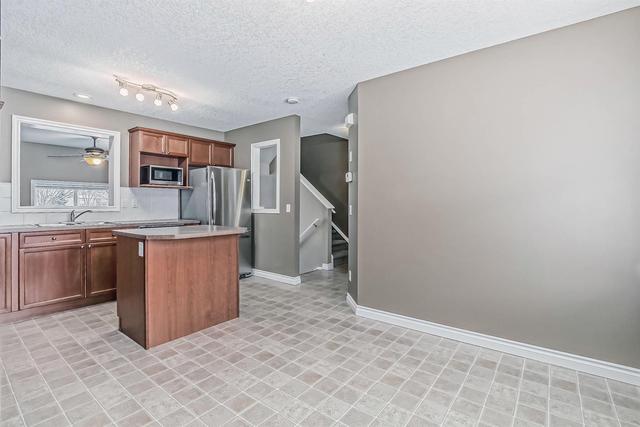 80 Crystal Shores Cove, Home with 3 bedrooms, 2 bathrooms and 2 parking in Calgary AB | Image 30