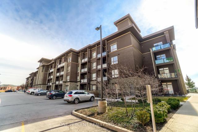 307 - 5010 Corporate Dr, Condo with 1 bedrooms, 1 bathrooms and 1 parking in Burlington ON | Image 1