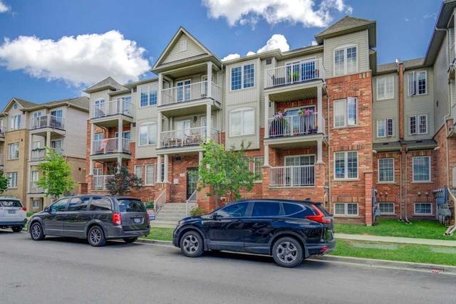 11 - 153 Isaac Devins Blvd, Townhouse with 2 bedrooms, 1 bathrooms and 2 parking in Toronto ON | Image 1