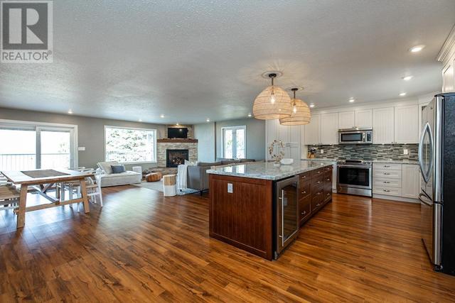 55680 Jardine Loop, House detached with 3 bedrooms, 2 bathrooms and null parking in Bulkley Nechako F BC | Image 4