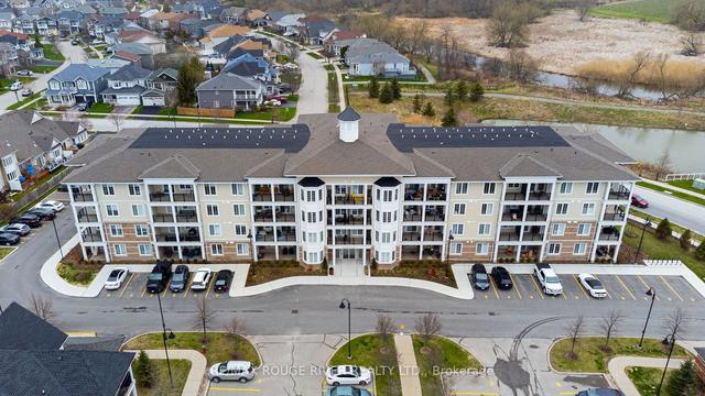 111 - 65 Shipway Ave, Condo with 3 bedrooms, 2 bathrooms and 1 parking in Clarington ON | Image 1