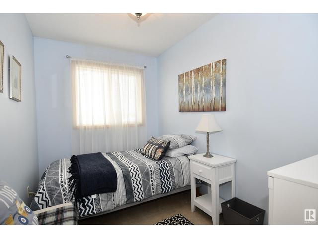 302 - 4604 48a St, Condo with 3 bedrooms, 1 bathrooms and 1 parking in Leduc AB | Image 15