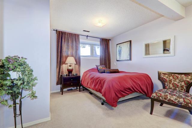 21 - 2323 Oakmoor Drive Sw, Home with 2 bedrooms, 1 bathrooms and 2 parking in Calgary AB | Image 1