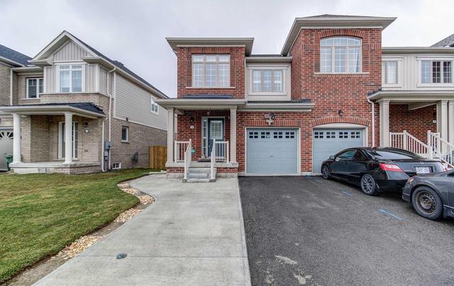 9 Frasson Dr, House attached with 3 bedrooms, 3 bathrooms and 2 parking in Guelph ON | Image 1