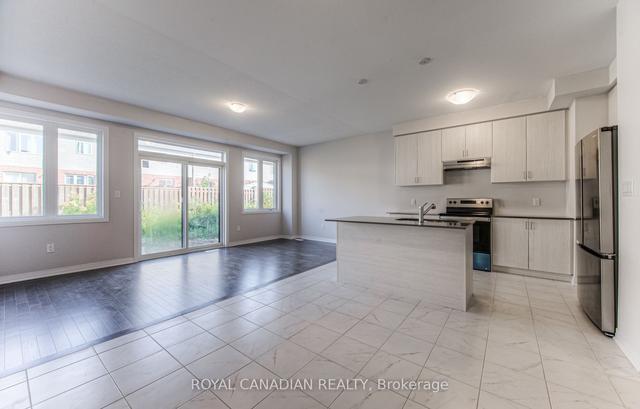 422 Robert Woolner St, House attached with 3 bedrooms, 3 bathrooms and 3 parking in North Dumfries ON | Image 2