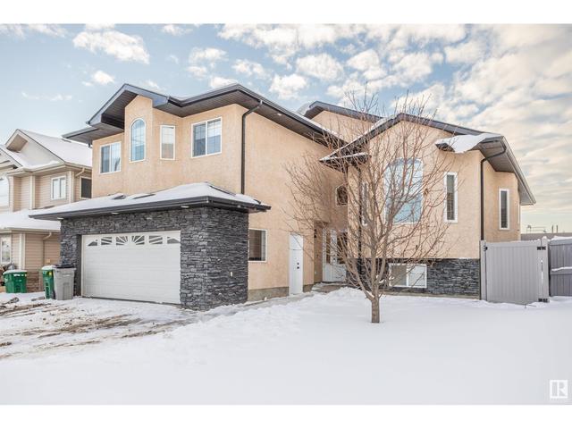 102 Houle Dr, House detached with 5 bedrooms, 3 bathrooms and null parking in Morinville AB | Image 2