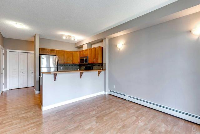 2101 - 211 Aspen Stone Boulevard Sw, Condo with 1 bedrooms, 1 bathrooms and 1 parking in Calgary AB | Image 9