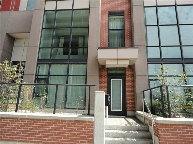 21 Town Centre Crt, Townhouse with 2 bedrooms, 2 bathrooms and 1 parking in Toronto ON | Image 1