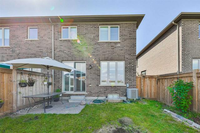 24 Heaven Cres, House attached with 3 bedrooms, 4 bathrooms and 3 parking in Milton ON | Image 35