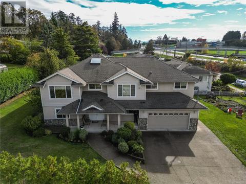 705 Chesterlea Rd, House detached with 4 bedrooms, 5 bathrooms and 6 parking in Saanich BC | Card Image