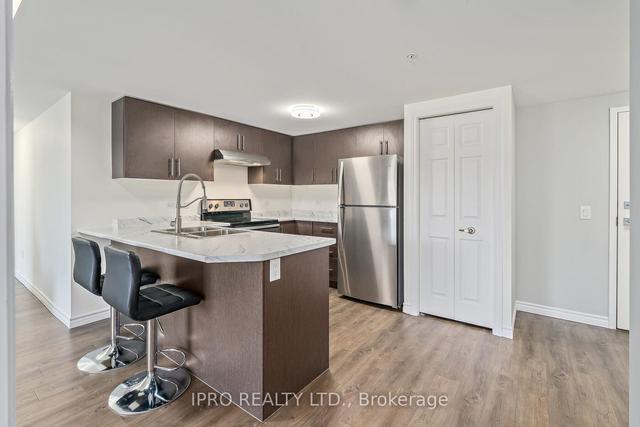 413 - 7 Kay Cres, Condo with 2 bedrooms, 1 bathrooms and 1 parking in Guelph ON | Image 24