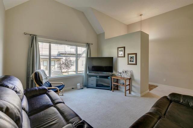 60 Cimarron Vista Gardens, House attached with 4 bedrooms, 2 bathrooms and 2 parking in Okotoks AB | Card Image